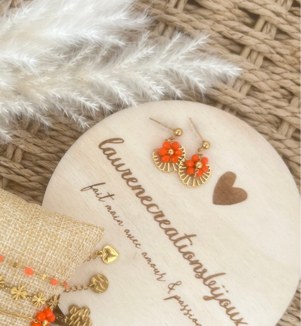 Boucles fleurs oranges