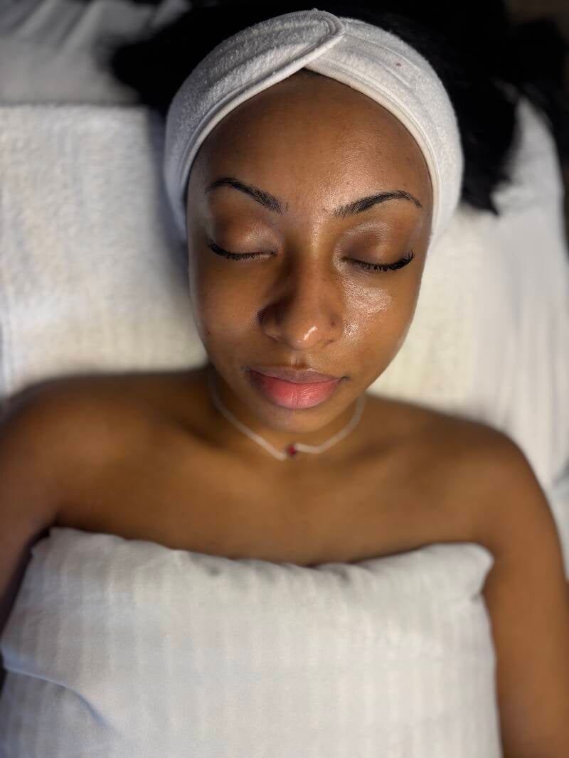 Glowing skin after a customized facial in Alpharetta GA focused on hydration and skin health