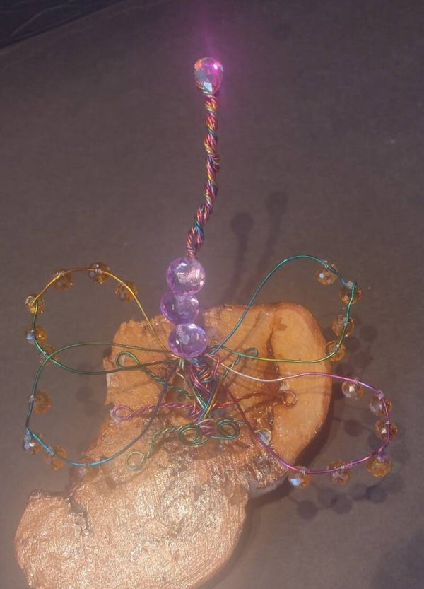 Besded Butterfly on wood