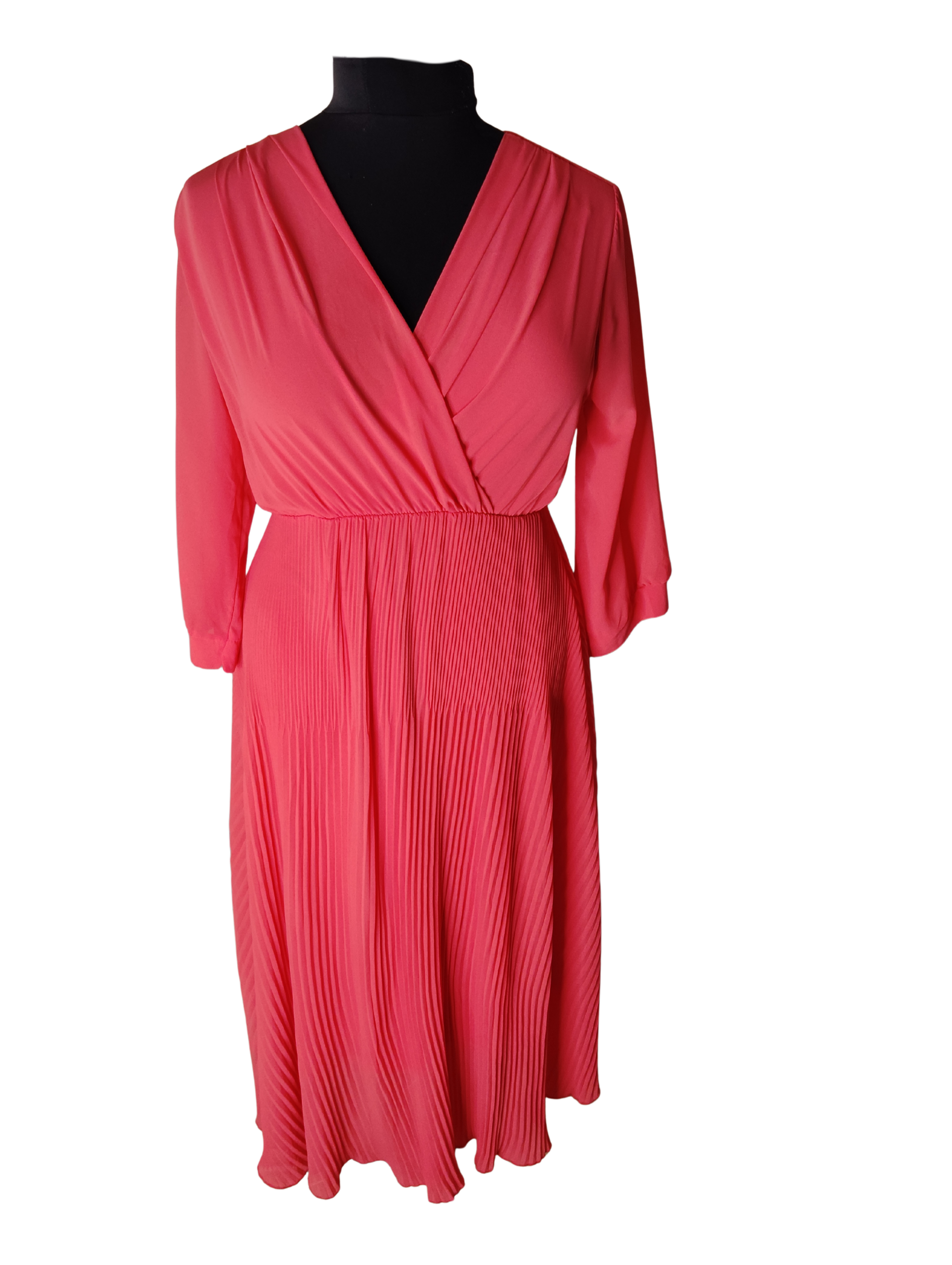 Orange pleated skirt dress with cross-over bodice.