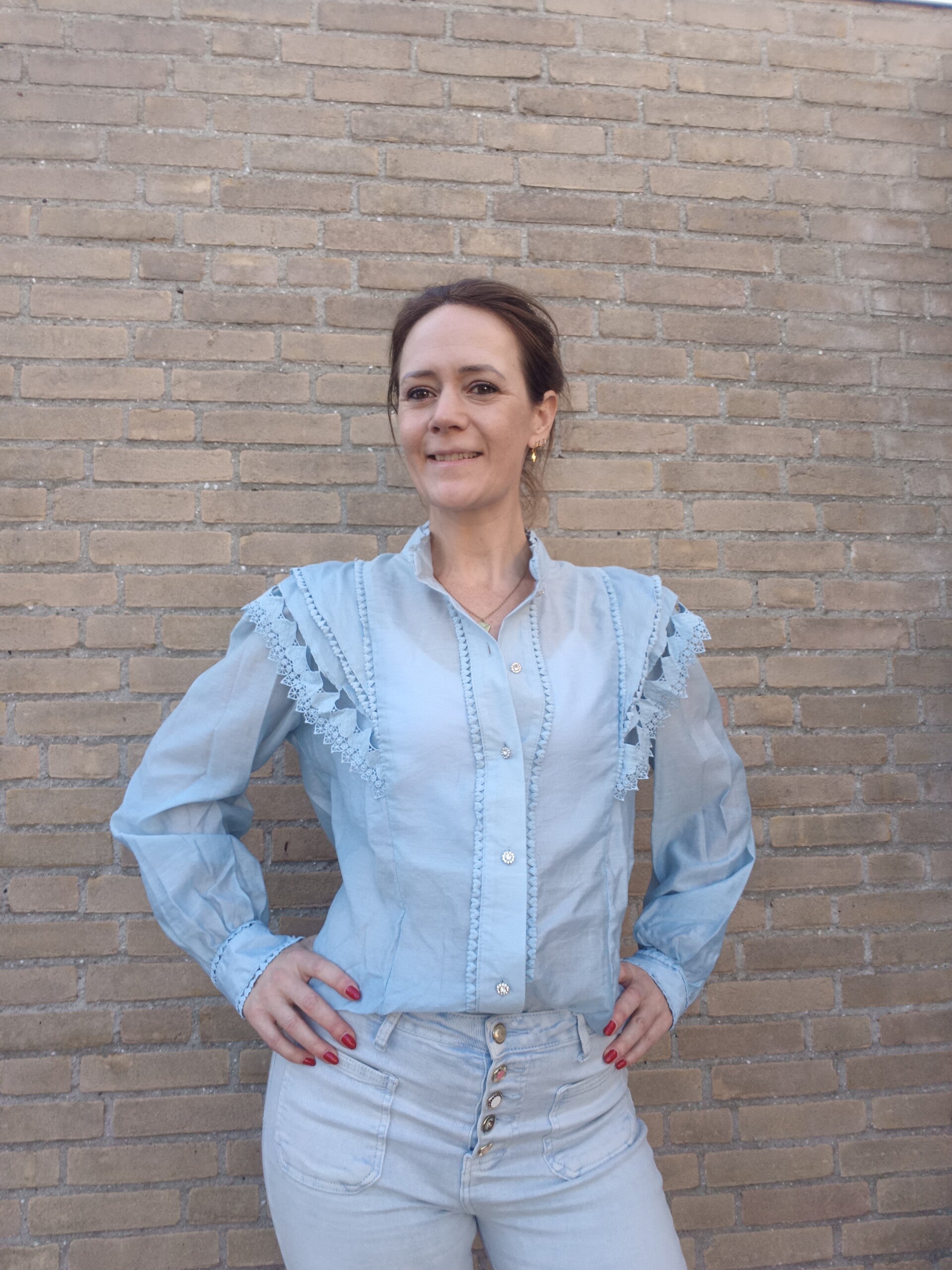Elegante blouse blauw met steentjes