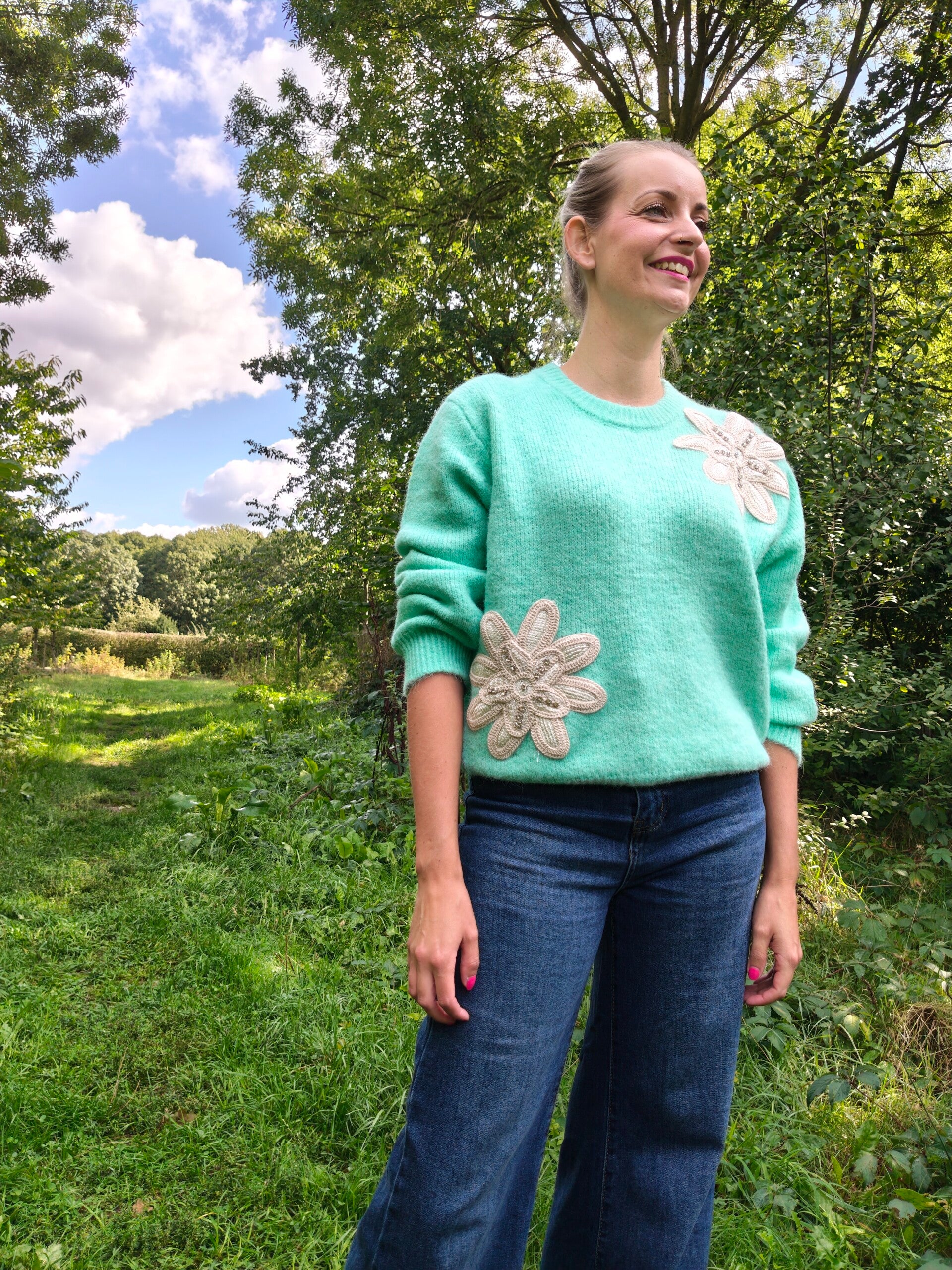 Trui bloemen turquoise