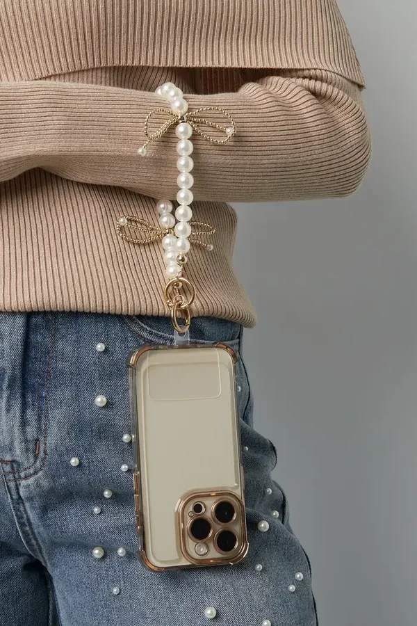 Telefoon accessoire parel/strik - Wit, goud