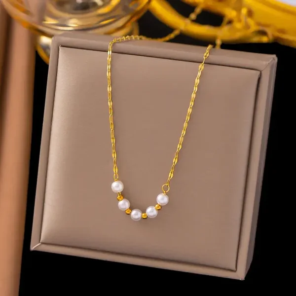 Collier de perles sourire or