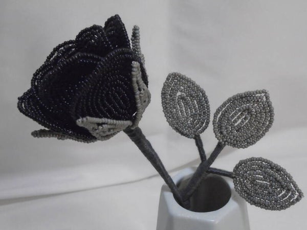 Black single stem rose