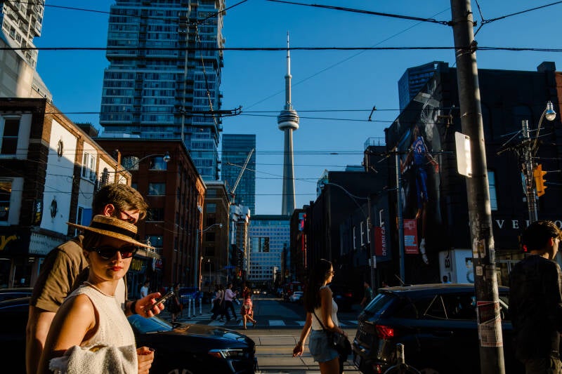 CN Tower view along Queen Street West Toronto