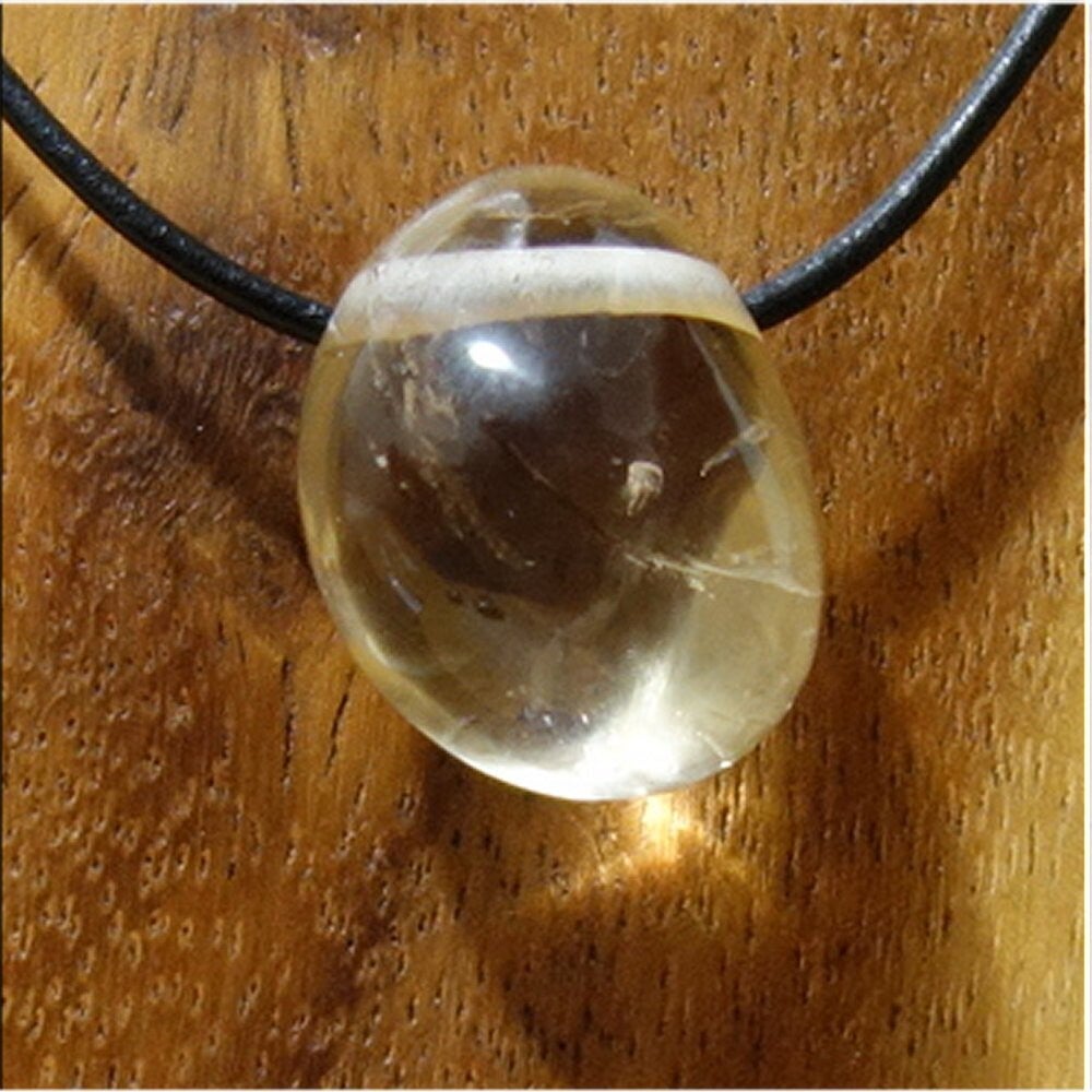 Citrin gebohrt mit 80 cm Band & Jutesäckchen