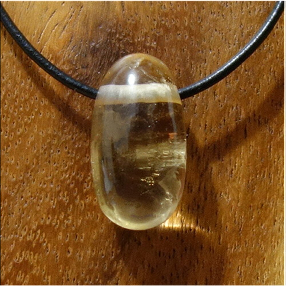 Citrin gebohrt mit 80 cm Band & Jutesäckchen