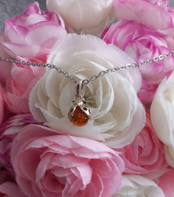 Pendentif Ambre coccinelle