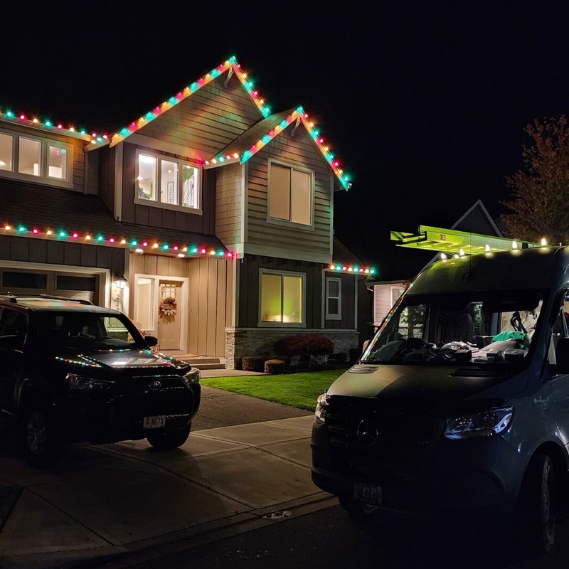 Outdoor residential holiday roofline lighting installed by Premium Holiday Lights in Salem, Oregon during wet Northwest winter weather