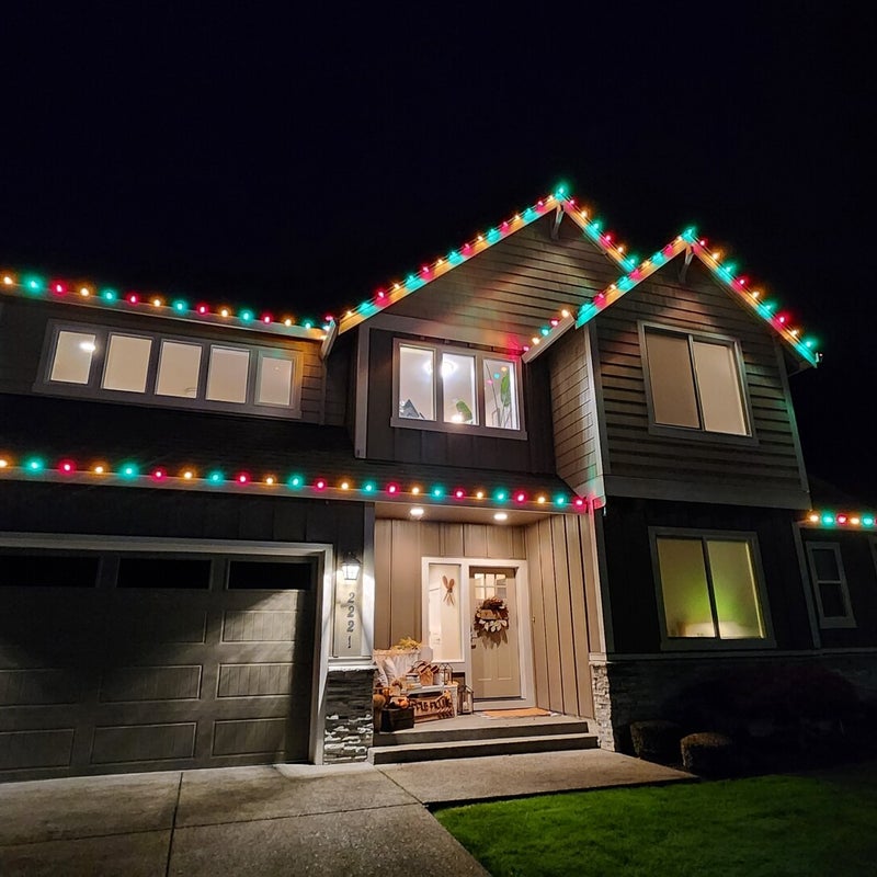 Permanent low-profile architectural trim lighting installed by Premium Holiday Lights on a Salem, Oregon home, warm evening accent glow