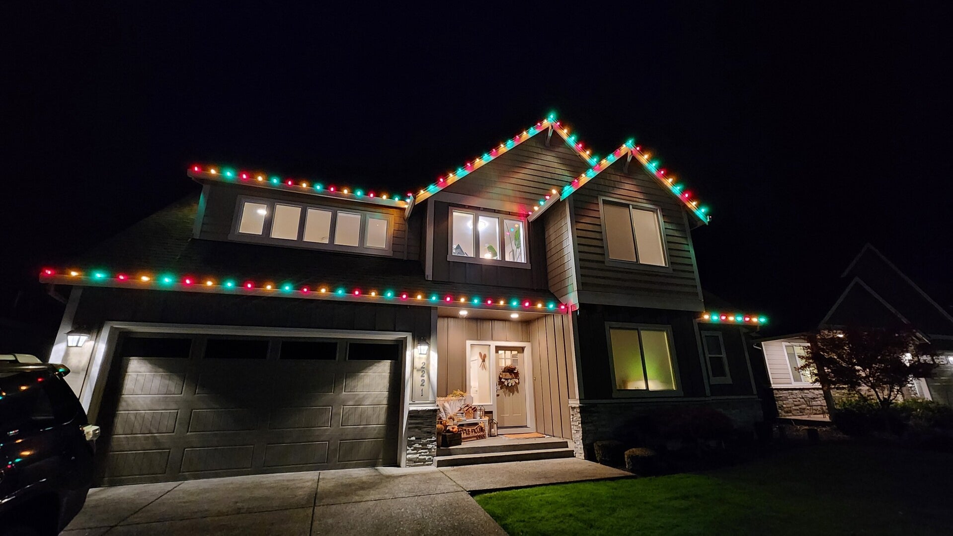 Authentic residential holiday lighting project at night by Premium Holiday Lights in Salem, OR