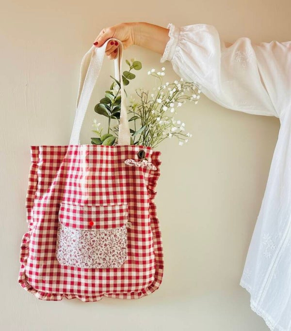 Tote bag con volante y bolsillo exterior