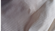 Regency Stripe Fabric. A striped thick cotten with pale cream background and butter yellow stripes.