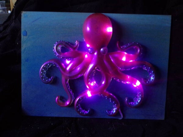 octopus in zee,  met lichtjes,  kameleon magenta/blauw