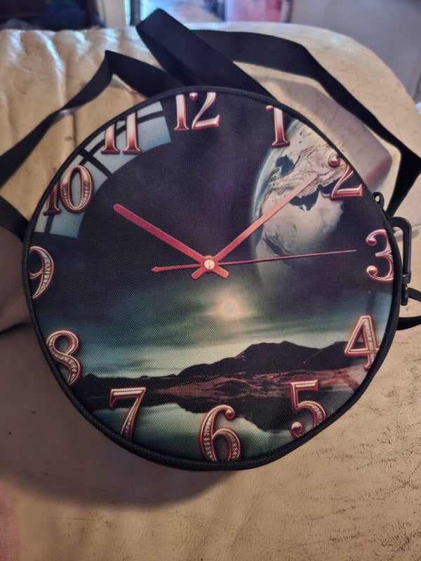 ronde handtas met klokprint