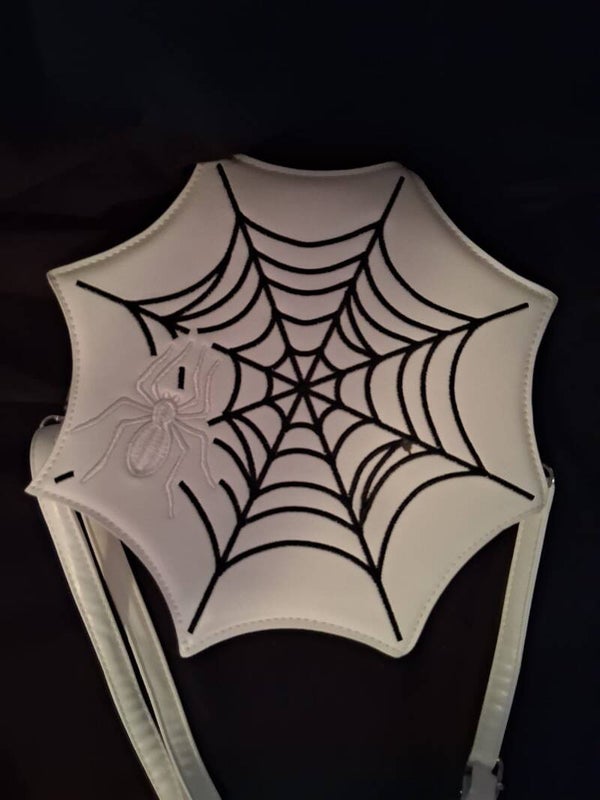 handtas in spinneweb vorm,  wit