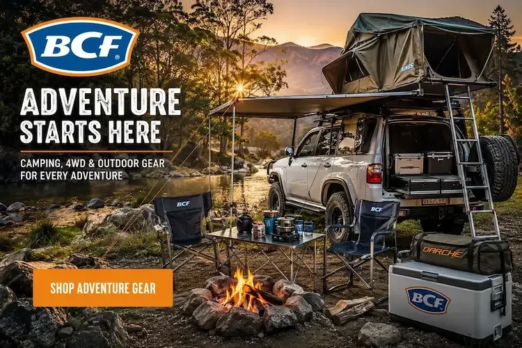 BCF campsite setup with 4WD vehicle and gear around a campfire