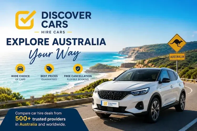 Discover Cars featuring a car on an Australian coastal road, used for comparing car hire deals from over 500 providers.