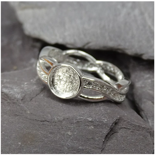 Solid Silver Entwinned Ring With CZ Stones