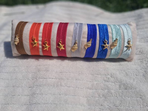 Bracelet à paillettes avec breloque
