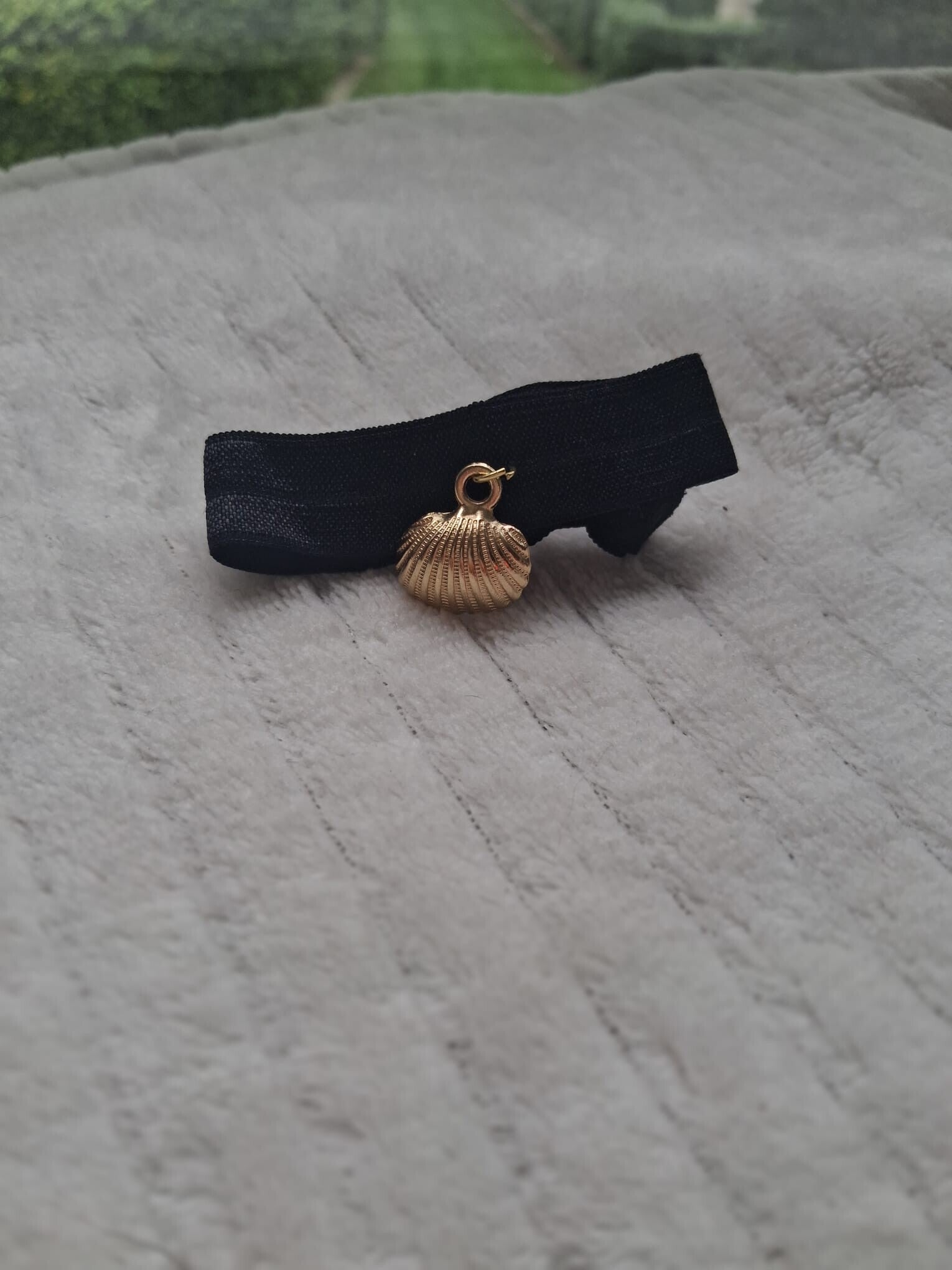 Bracelet à paillettes avec breloque