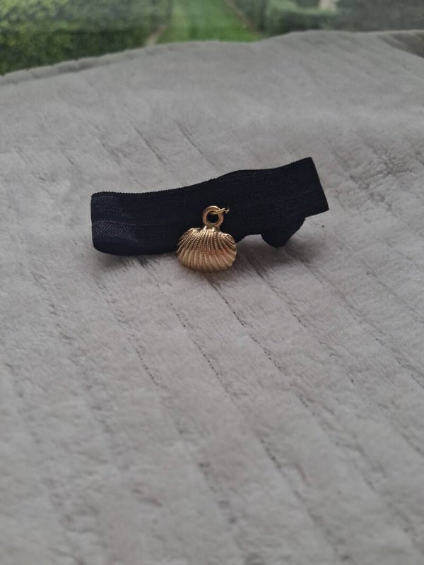 Bracelet à paillettes avec breloque