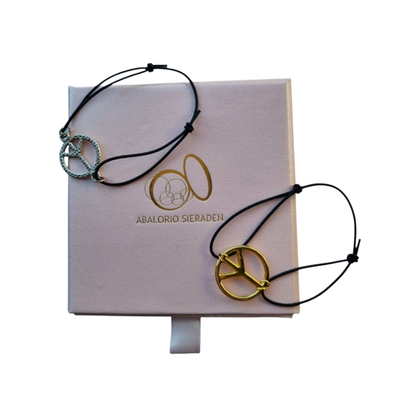 Armband van zwart elastiek met peace teken goud of zilver