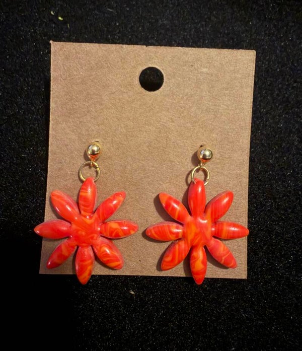 Modèles marguerite rouge et orange.