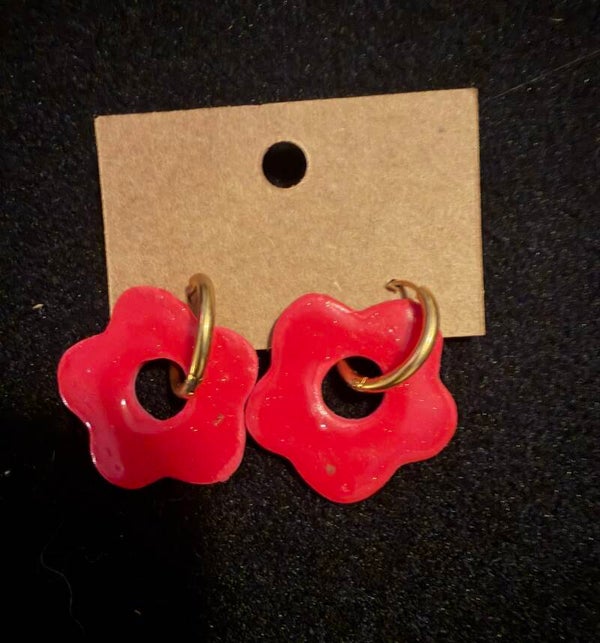 Modèles anémone rouge à pailletés.