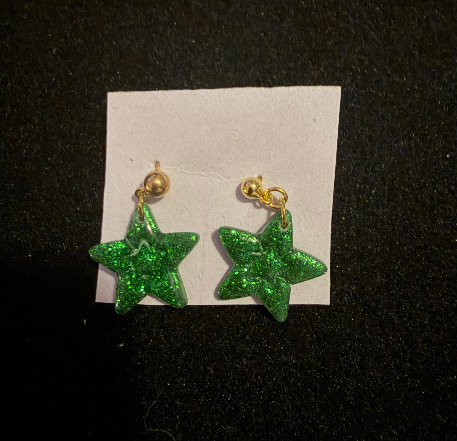 Modèles étoile verte pailletés.