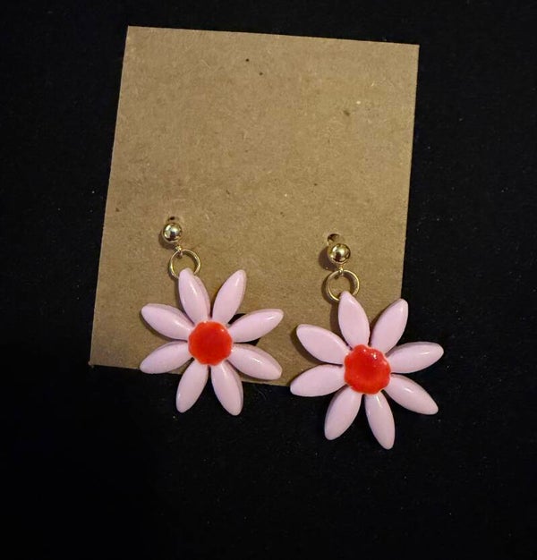 Modèles marguerite rose et rouge.