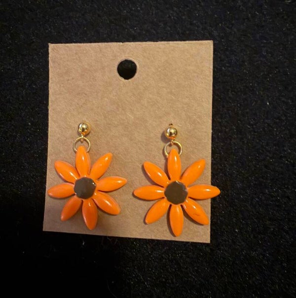 Modèles marguerite orange et marron.