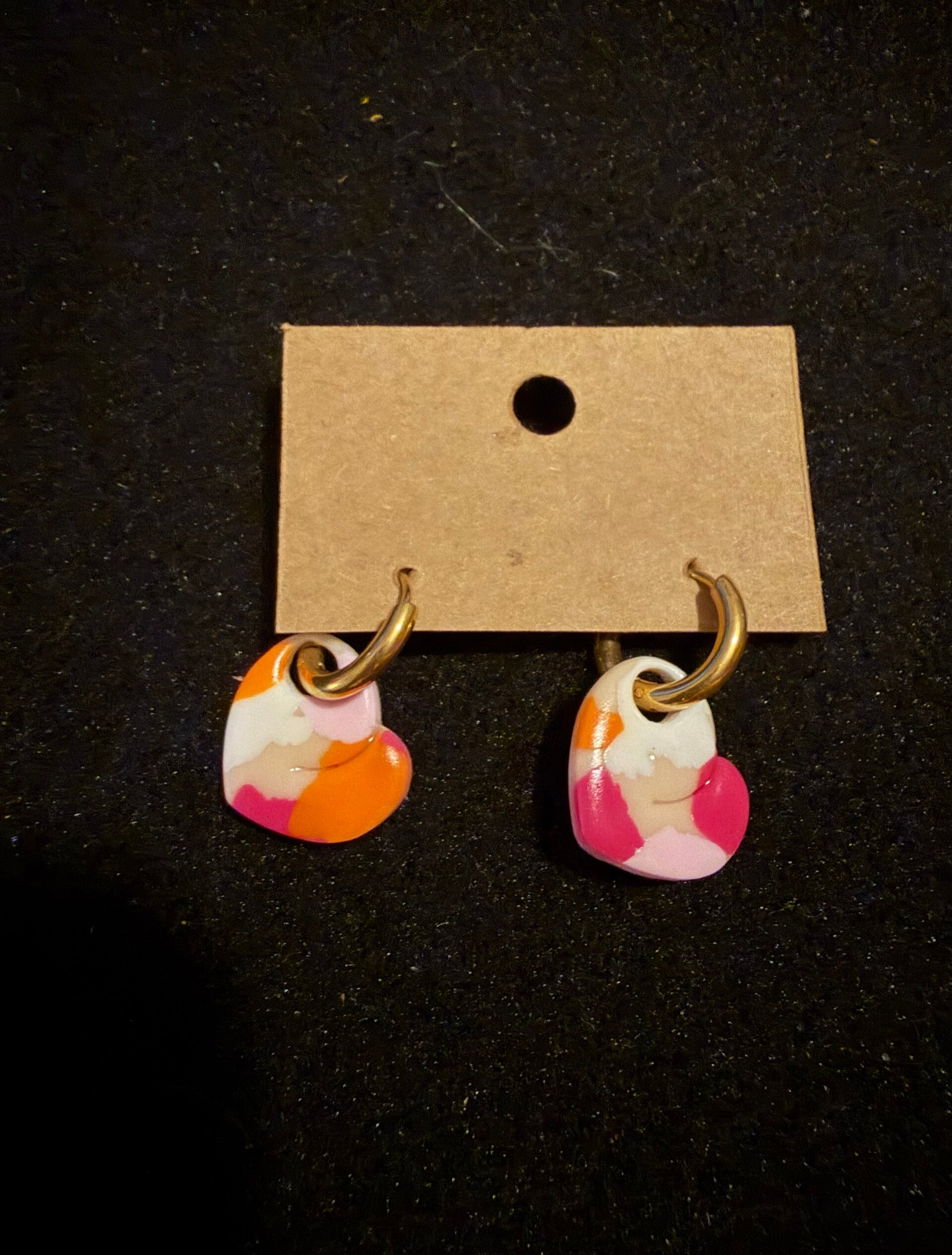 Modèles coeur blanc orange et rose.