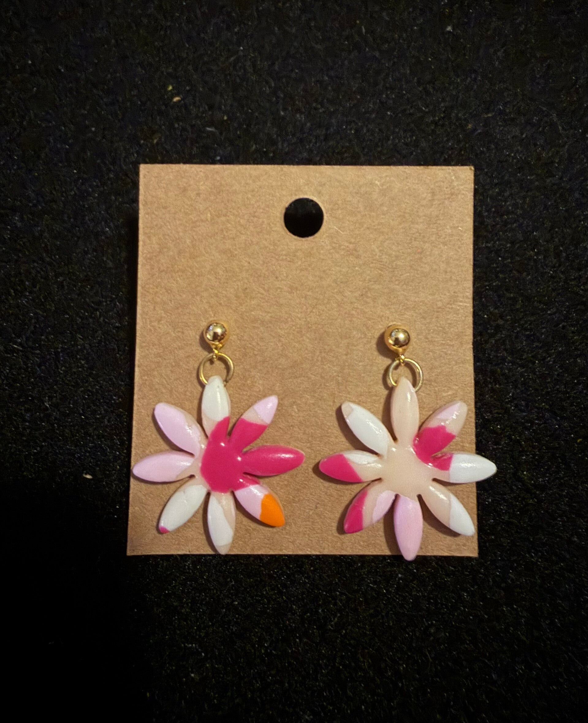 Modèles marguerite blanche rose et orange.