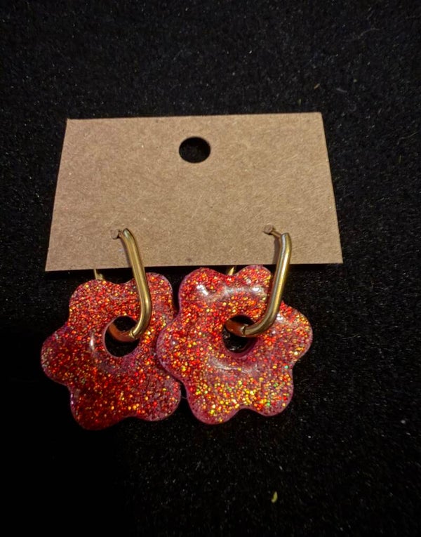 Modèles anémone rouge pailletés.