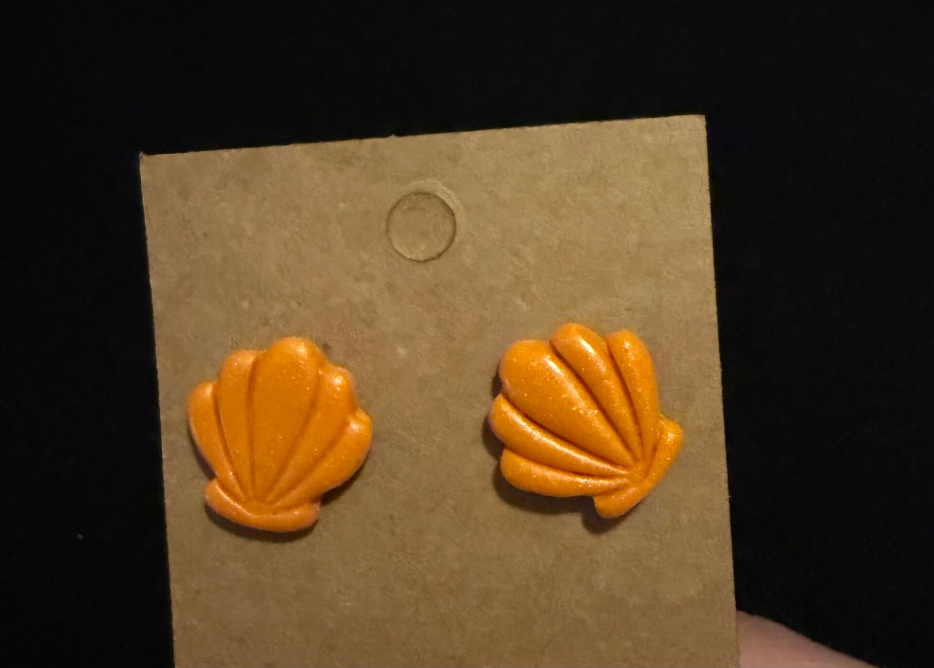 Modèles coquillage orange.