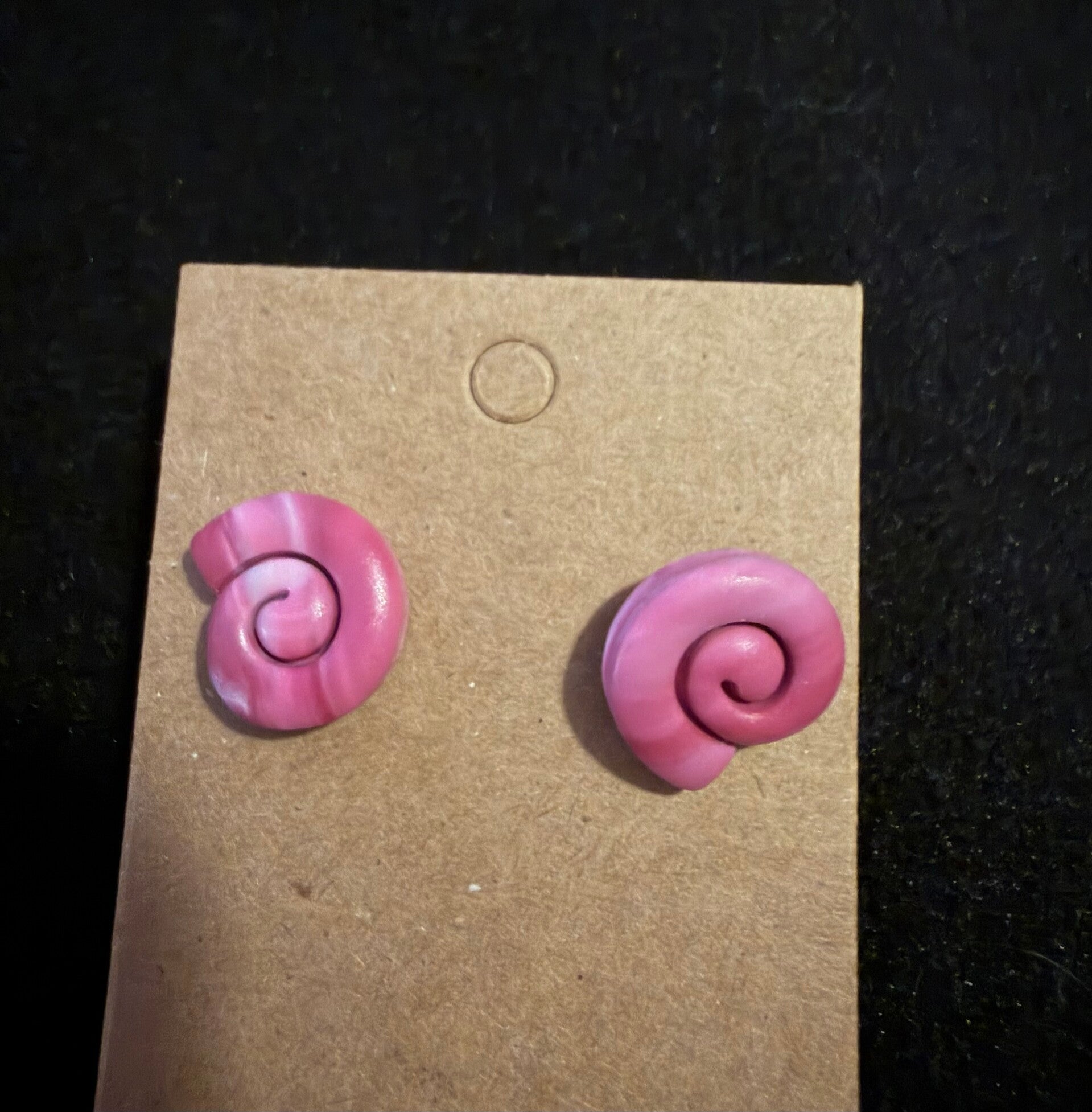 Modèles escargot rose et blanc.