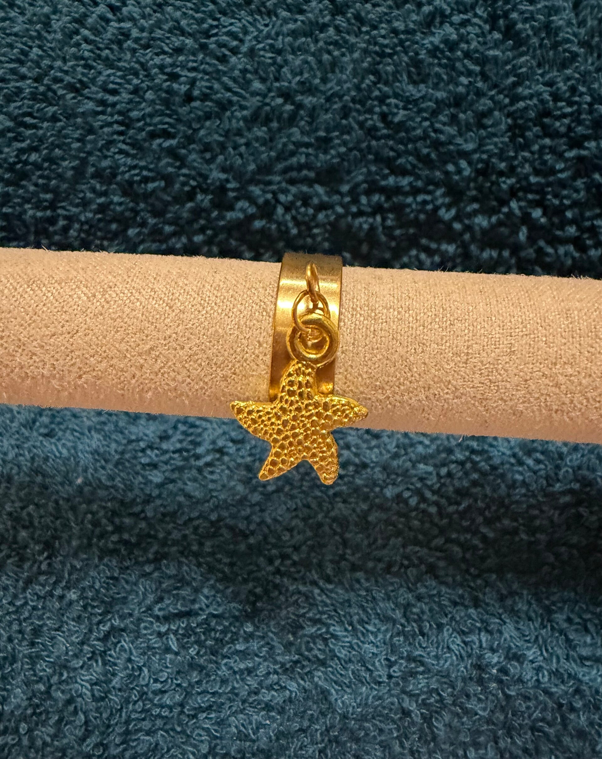 Bague a breloque étoile de mer.
