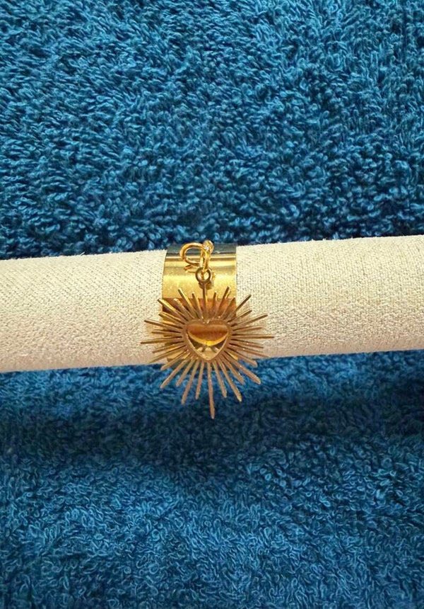 Bague a breloque soleil.