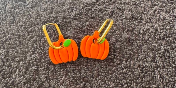 Boucles d’oreilles Citrouilles orange et verte.
