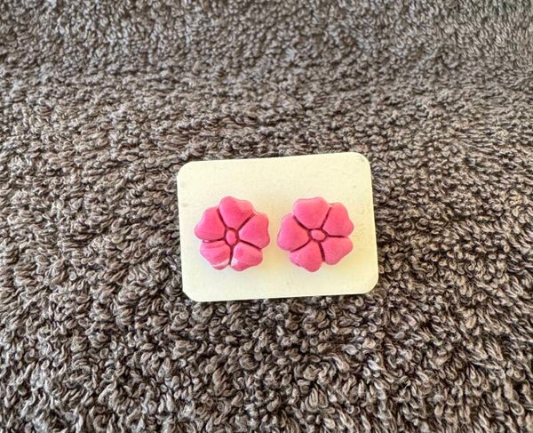 Boucles d’oreilles fleur rose.
