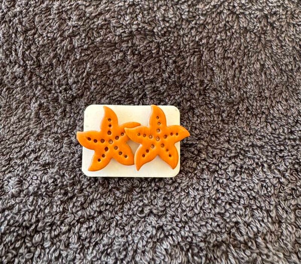 Boucles d’oreilles Étoiles de Mer orange.