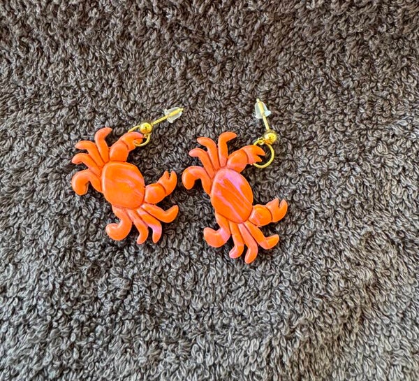 Boucles d’oreilles Crabes orange.