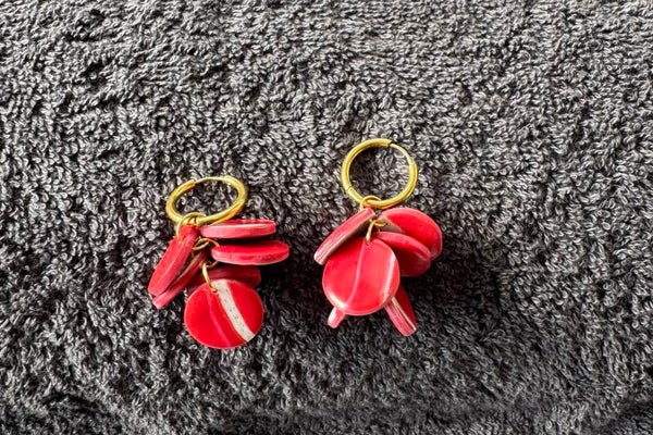 Boucles d’oreilles bulle rouge et blanche.