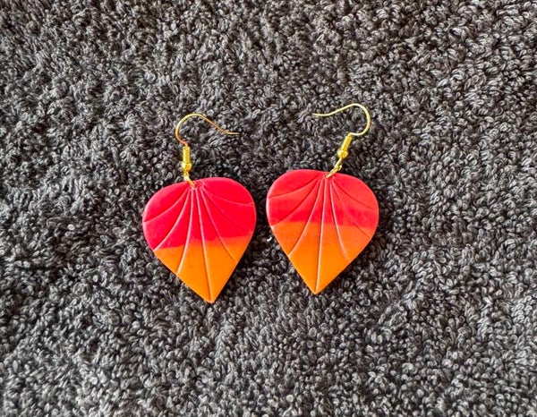 Boucles d’oreilles feuilles rouge et orange.