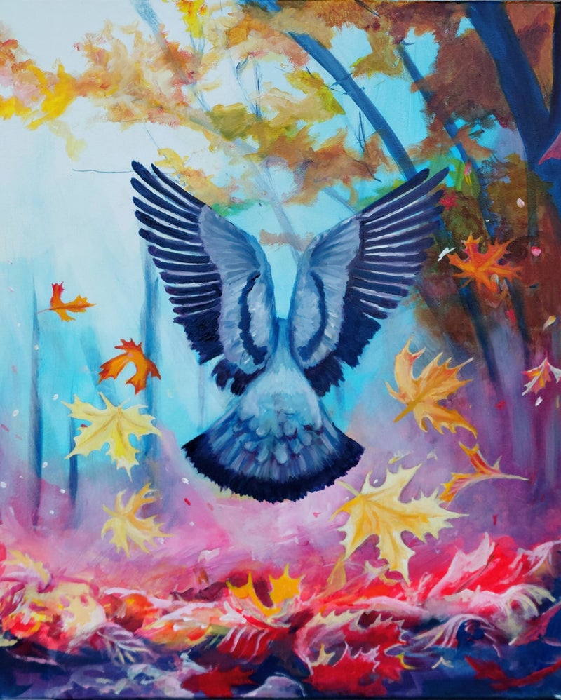 En duva med utbredda vingar svävar bland virvlande höstlöv i ett färgstarkt skogslandskap. 50x61 cm