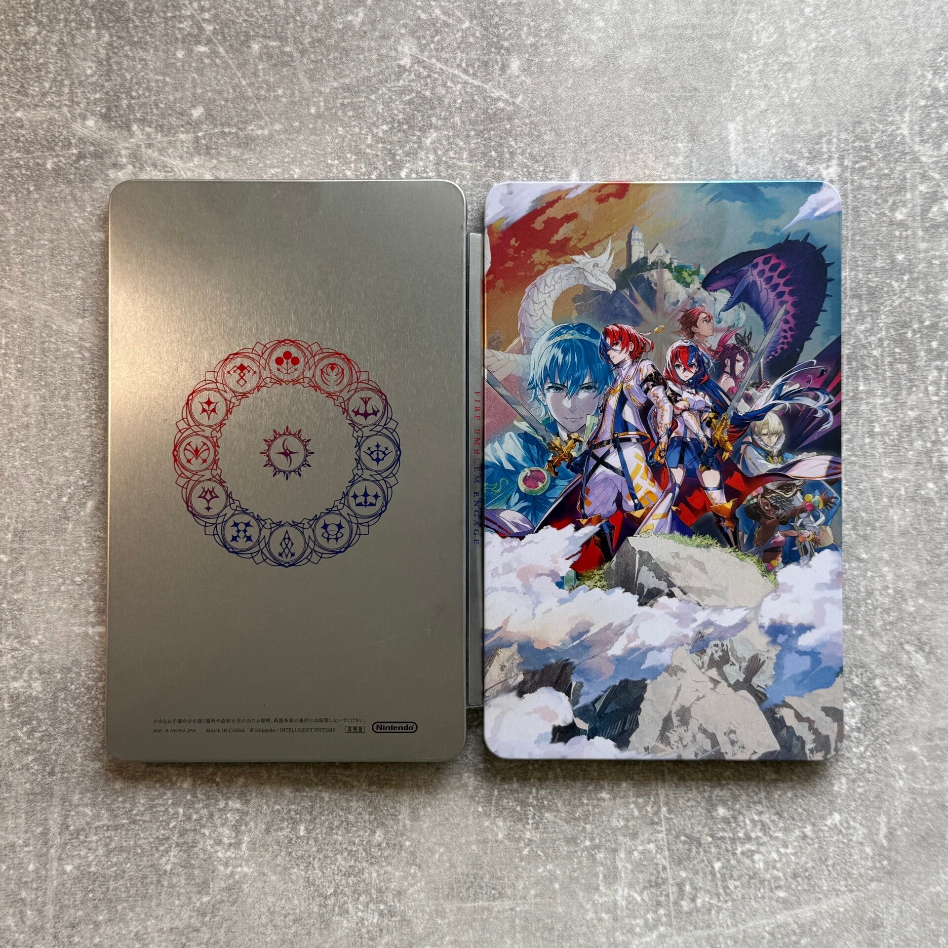 Fire Emblem Engage – Elyos Collection Steelbook & 12 Emblem Art
