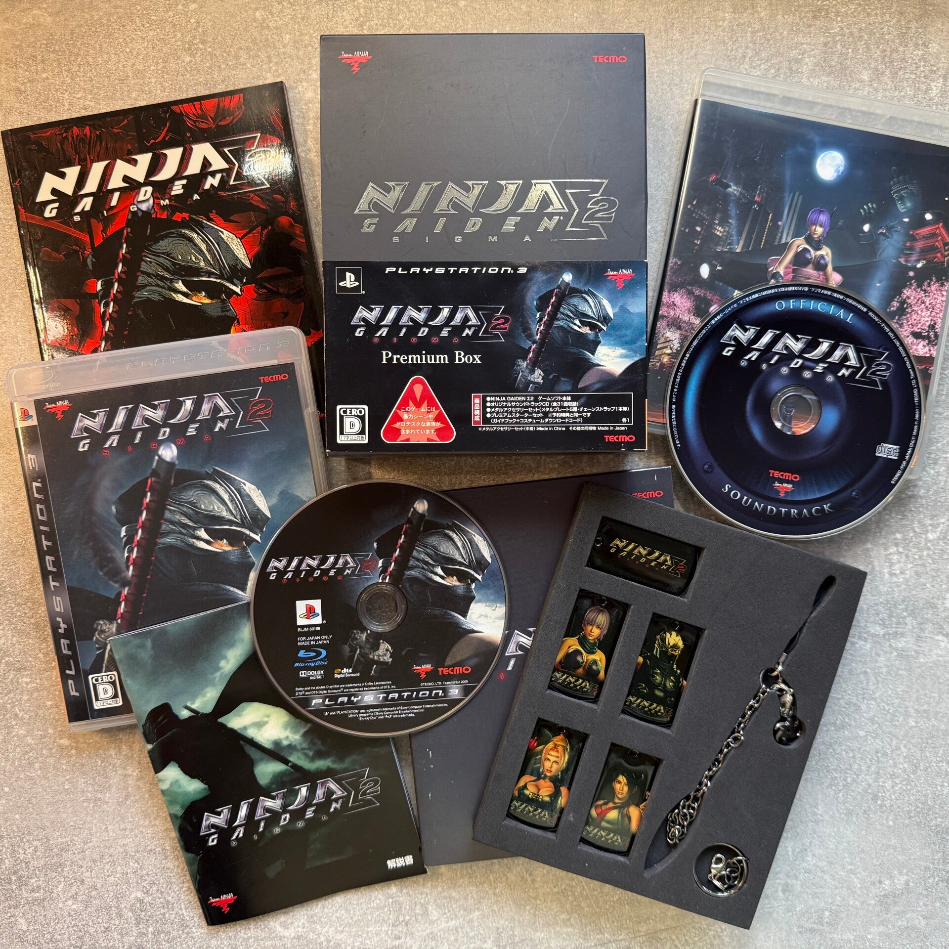 Ninja Gaiden Σ2 Premium Box | PS3 | OST CD, Metal Tags & Premium Starter Book | Japan Import