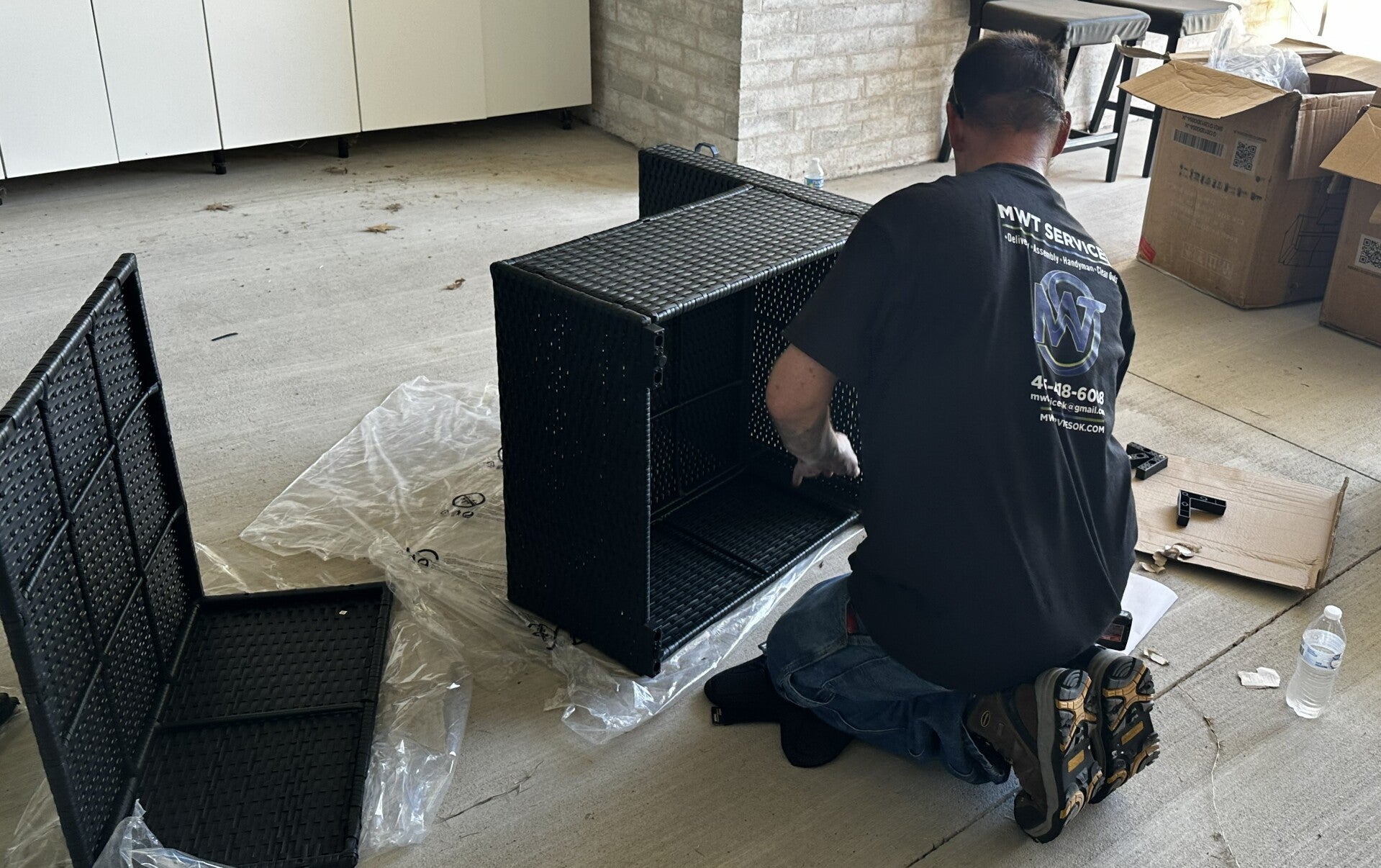 Tech assembling a patio set
